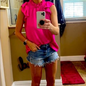 High neck, neon pink blouse